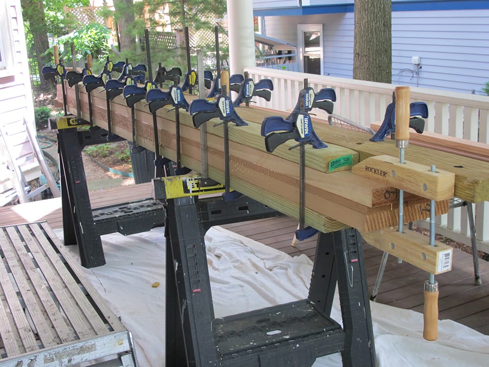 We glued up several pieces of 2x6 cedar stock to achieve the required thickness.