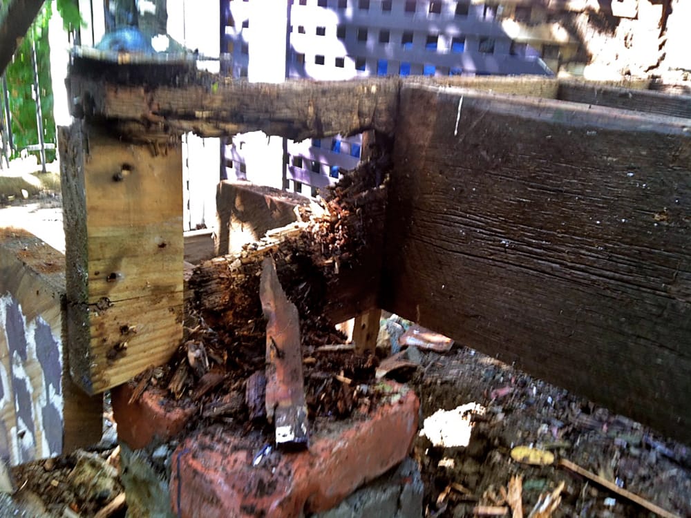 The owner could not sell his home with rotted stairs. As we demolished, the rot came into full view.