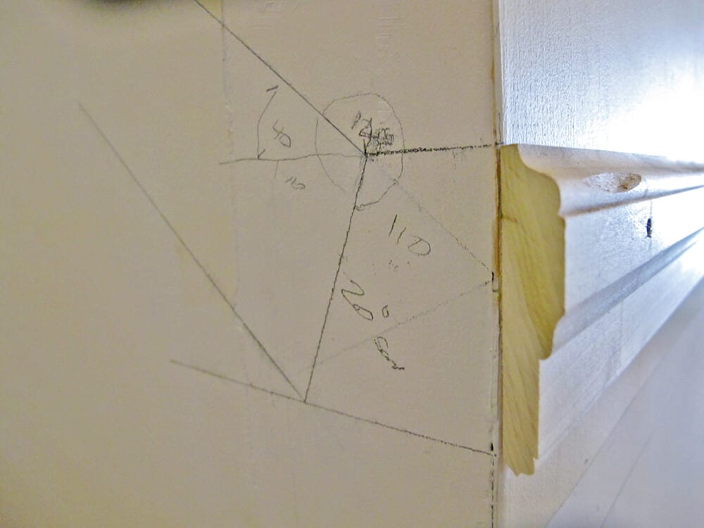 At corners, we drew the chair rail on the wall, and measured and cut our stock from that.