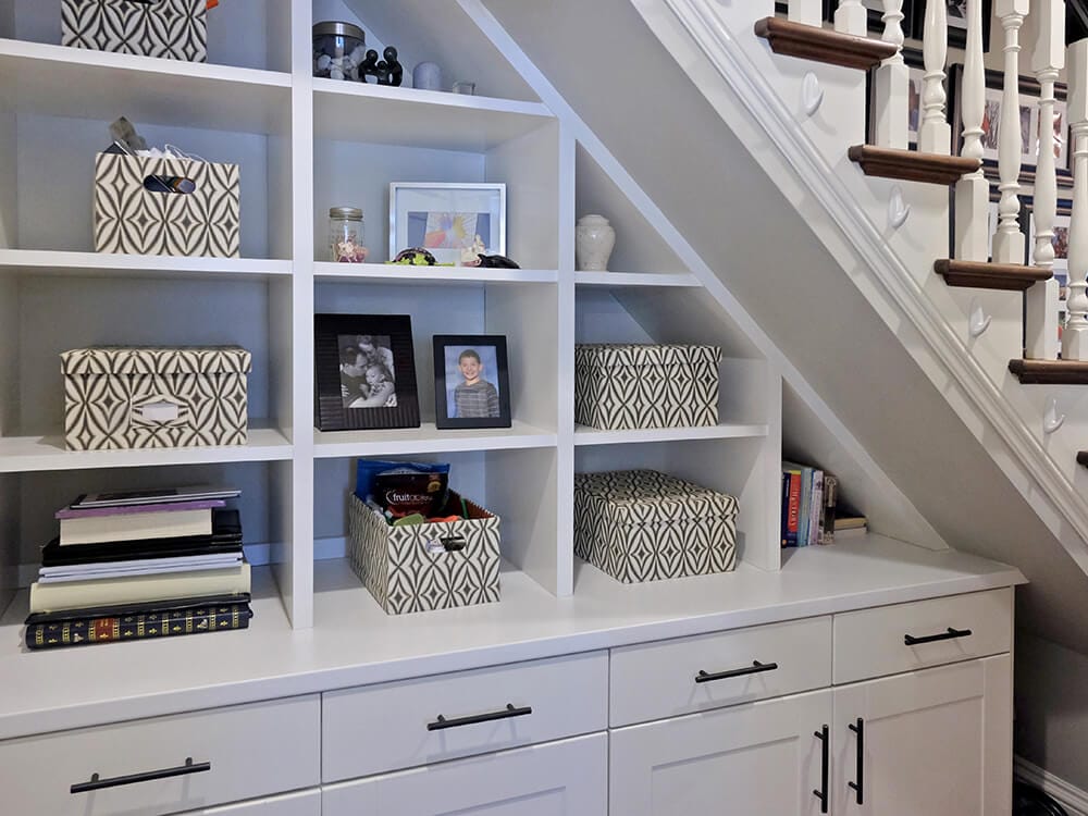 Cabinets Under Stairs with bookshelves