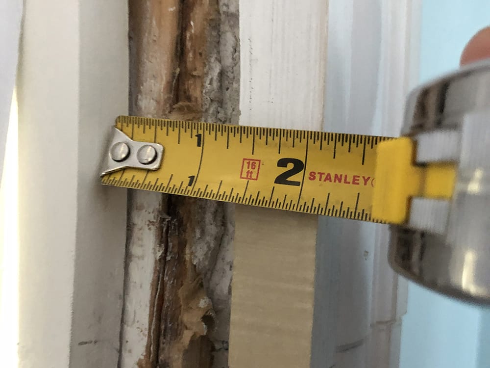 On the left side of the casing, the window was 2-1/8” away.