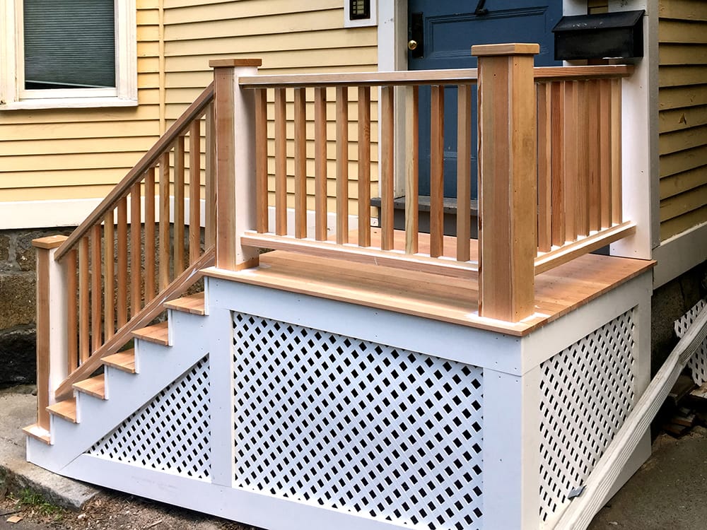 Brand new stairs and balustrade, ready for paint.