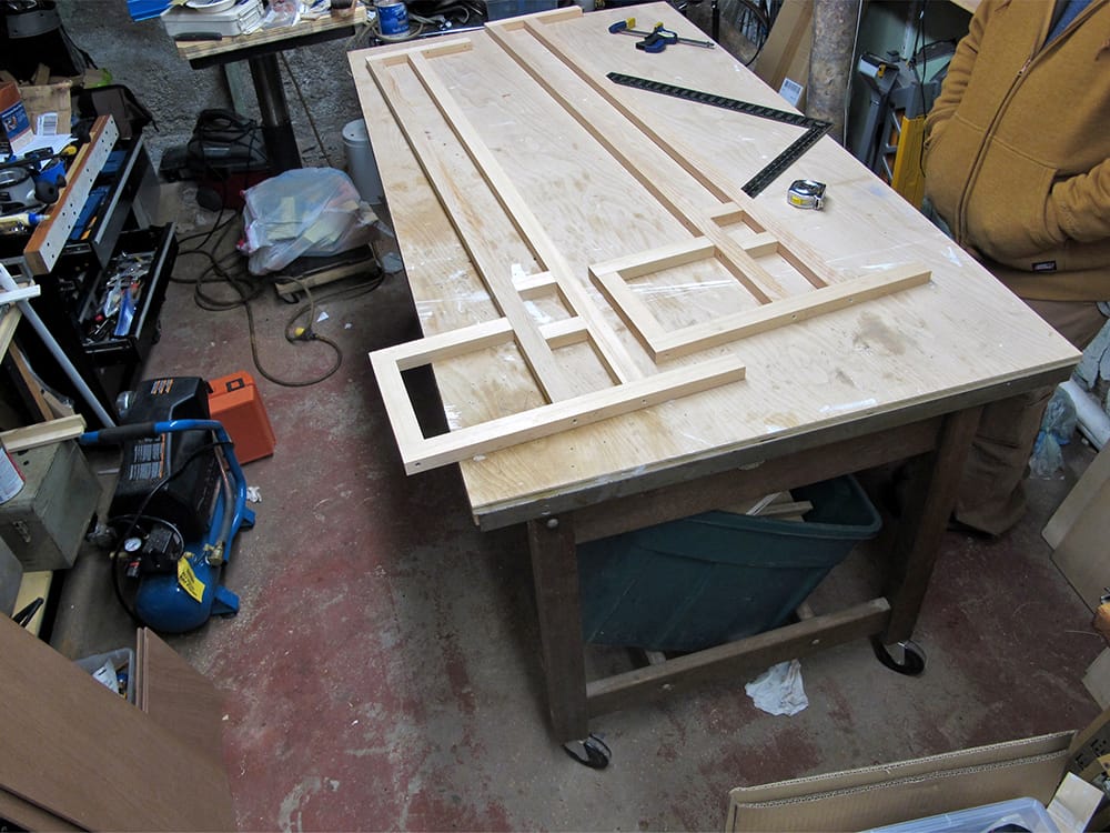 These are the frames for the shelves. The back face of the frame is open to accept the jig that is mounted on the wall.
