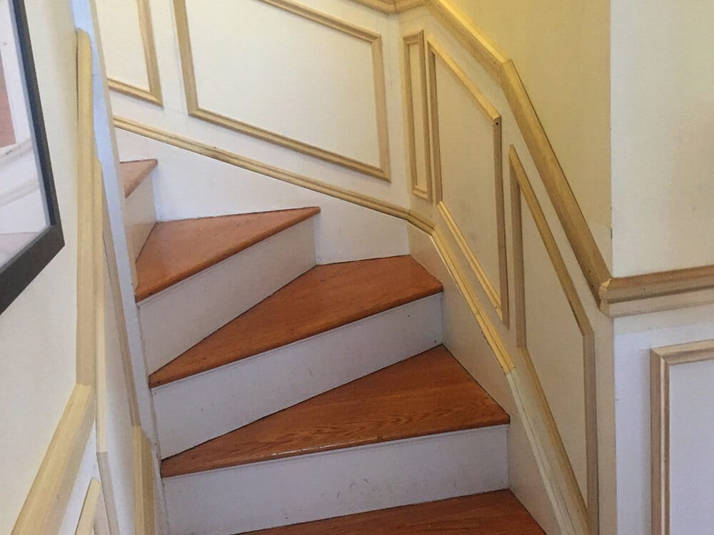Stairway carpentry completed. No two picture frames were the same.